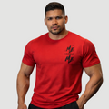 Man wearing a red t-shirt with 'Me Versus Me' text on a gray background