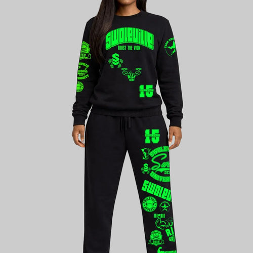 Black sweatshirt and pants set with green graphics on a gray background